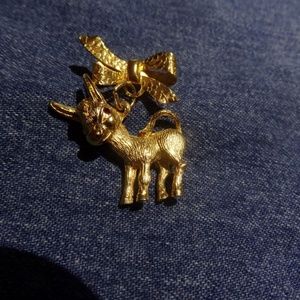 Vintage Goldtone Donkey Hanging From Bow Brooch